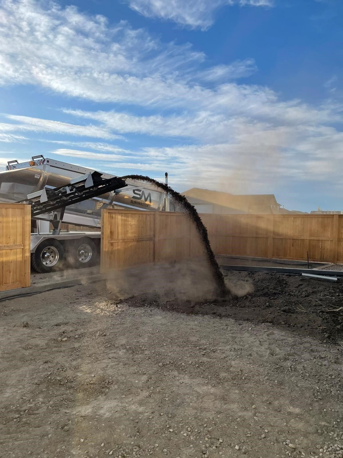 Sling Master stone slinger truck with conveyor boom raised